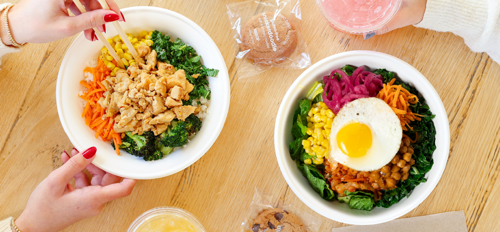 Closeup of a person holding a BIBIBOP Bowl