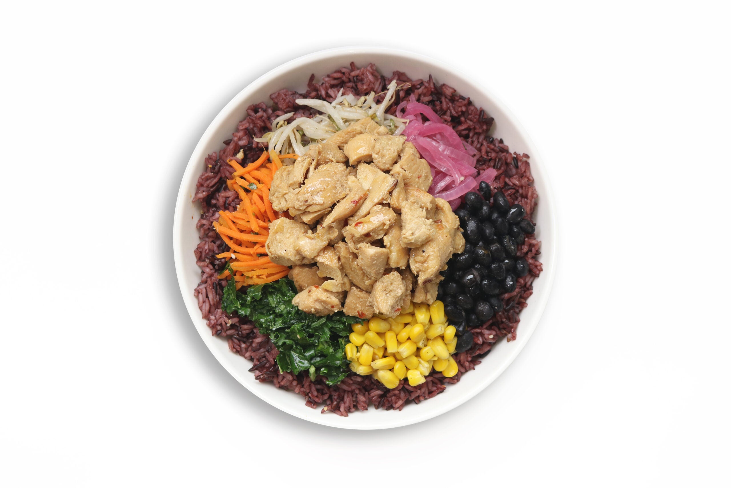 Chicken over Purple Rice with Carrots, Bean Sprouts, Pickled Red Onion, Black Beans, Corn and Kale in a BIBIBOP bowl
