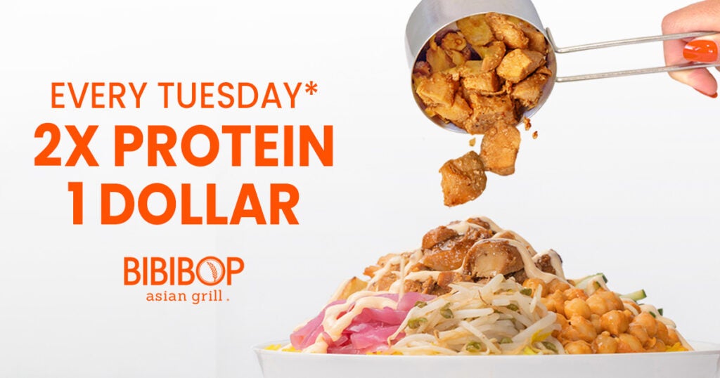 Scooping more protein onto a BIBIBOP bowl